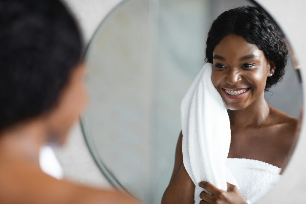 Beautiful african american woman enjoying morning beauty routine